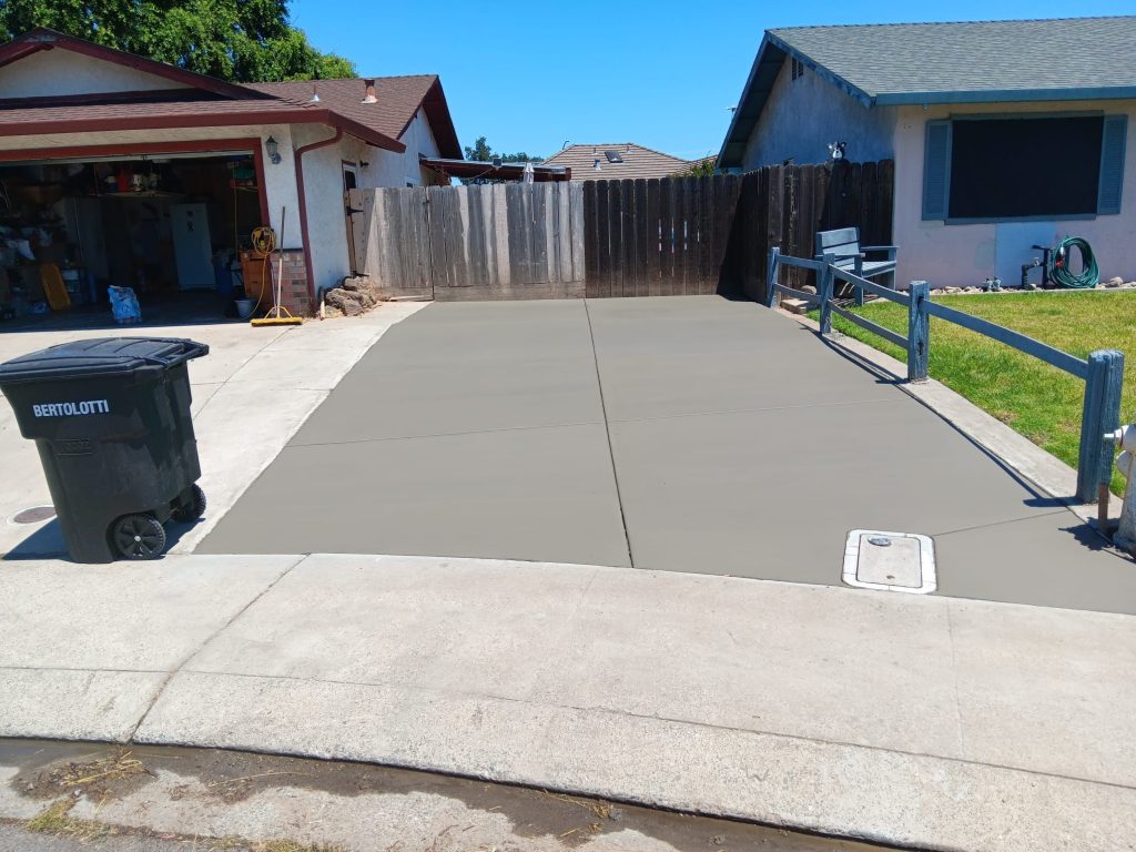 How long should you wait before driving over new concrete? In 28 days, your concrete will reach about 90% of its total strength.